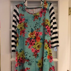 Brightly colored long blouse